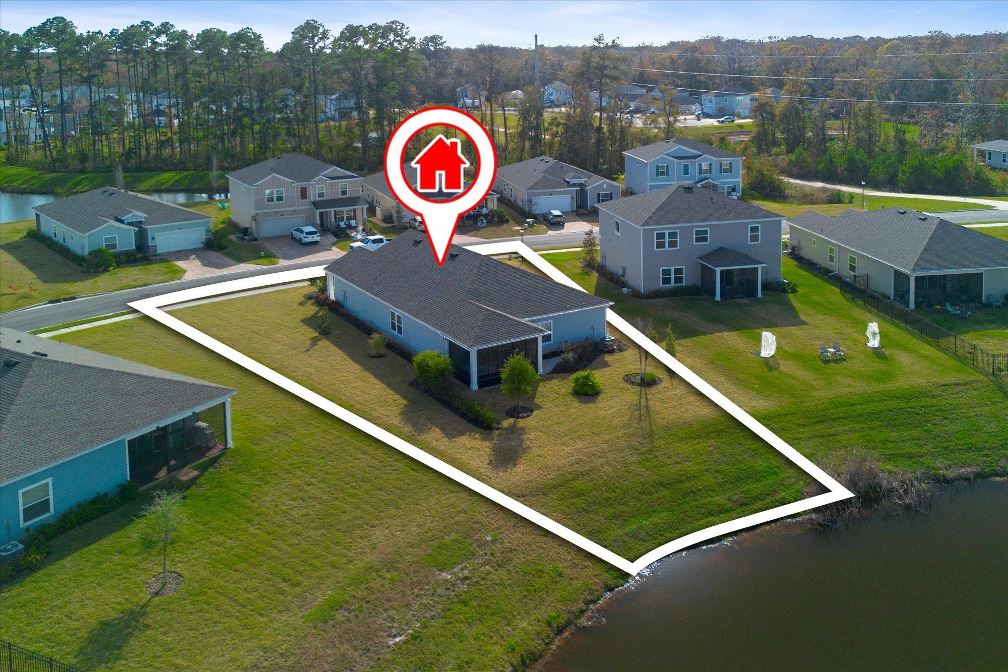 204 Field Flower Way St. Augustine, FL 32092 - Photo 56 of 60 Aerial view of residential area with a nearby body of water