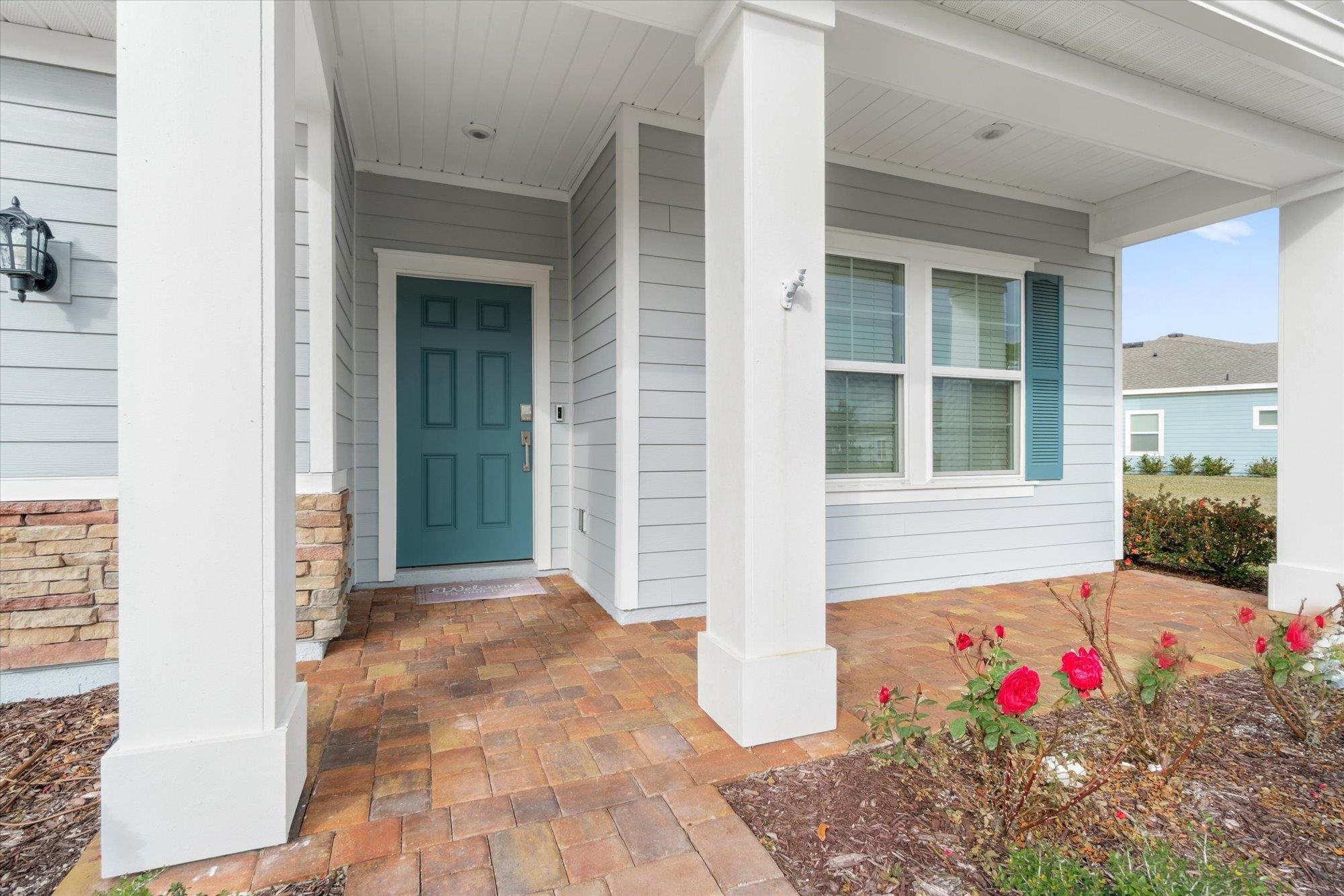 204 Field Flower Way St. Augustine, FL 32092 - Photo 10 of 60 a view of a potted plant in front of a house