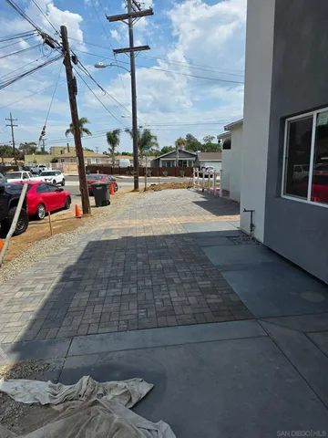 a view of a street with cars