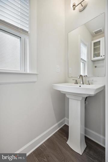 325 Piper Lane Exton, PA 19341 - Photo 20 of 24 a bathroom with a sink and a mirror