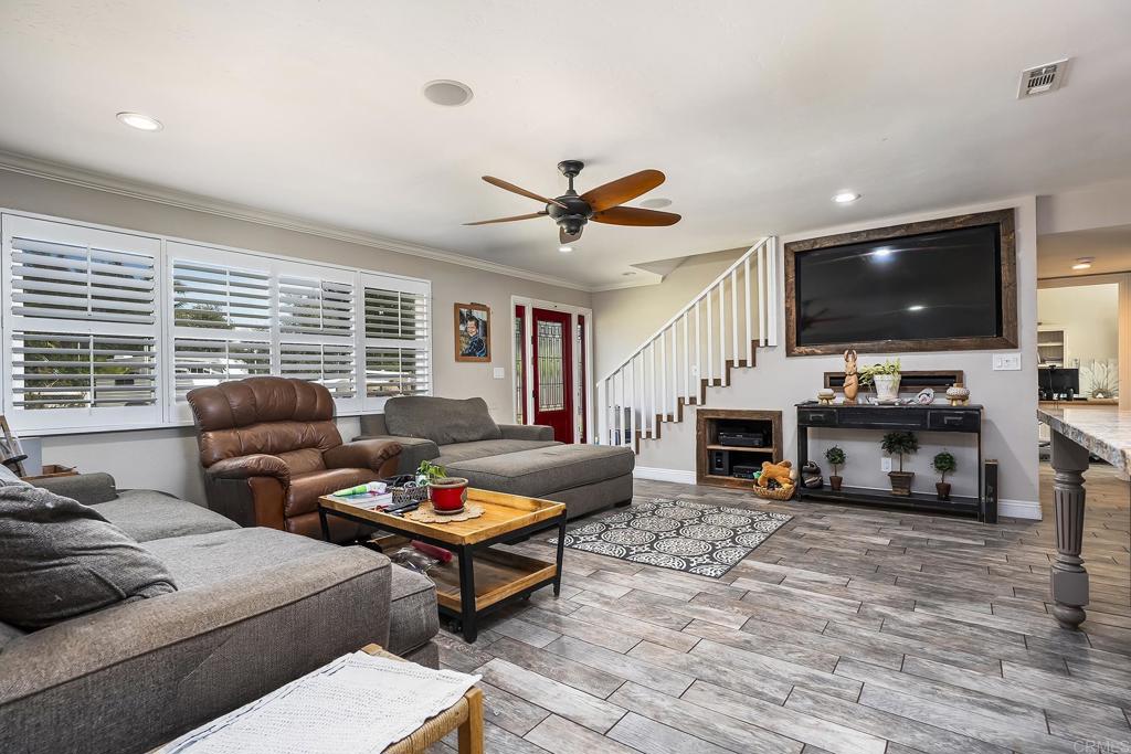 2430 Geyer Lane Alpine, CA 91901 - Photo 6 of 60 a living room with furniture and a flat screen tv