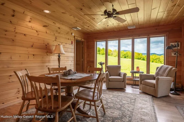 a bathroom with a granite countertop sink vanity and a mirror