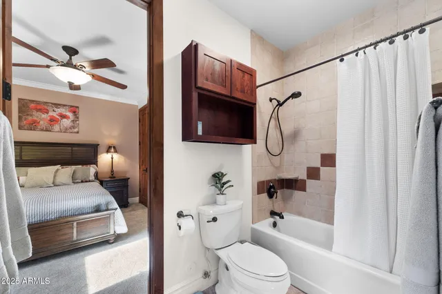 a en suite bathroom with a sink toilet and shower