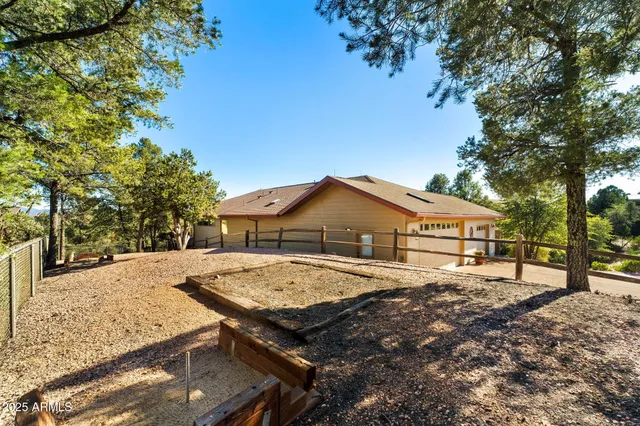 a house with trees in the background