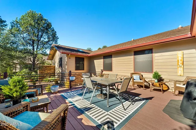 a view of a patio with couches and table