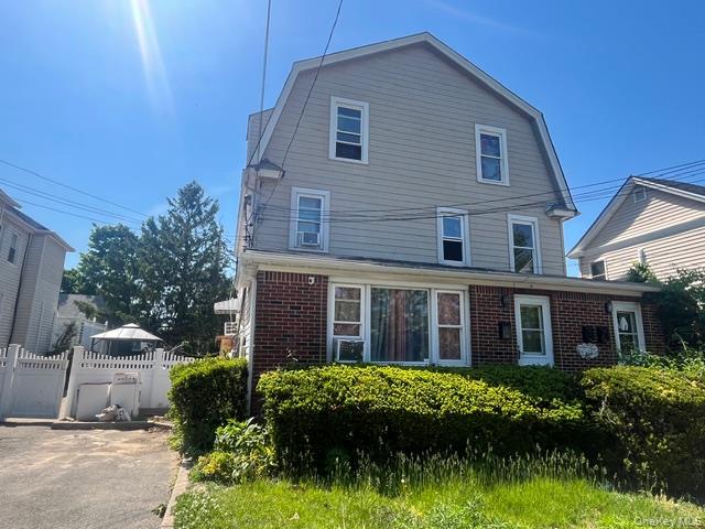 45 James Street Inwood, NY 11096 - Photo 1 of 11 a house that has a lot of plants in it