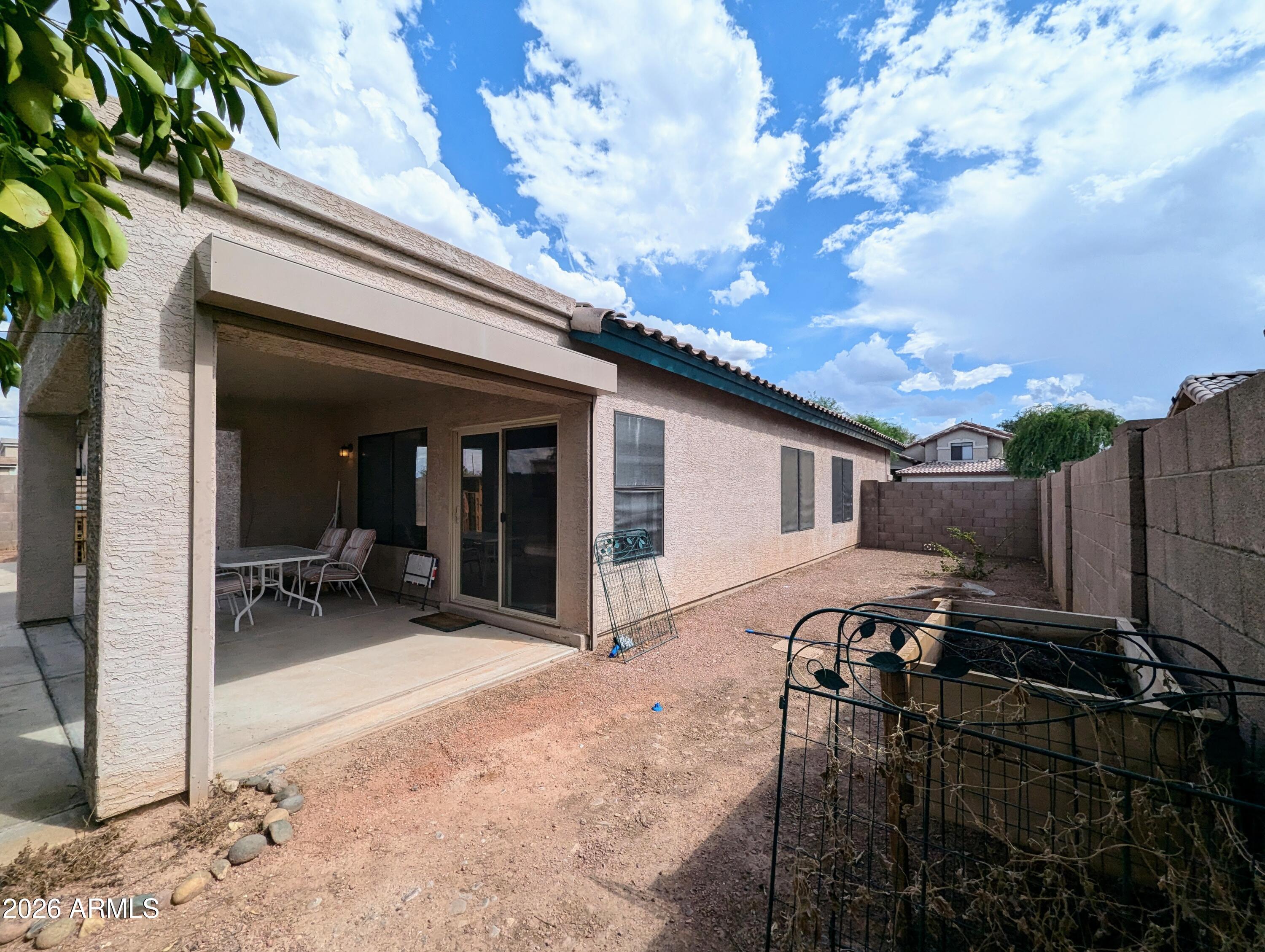 5424 West Wagoner Road Glendale, AZ 85308 - Photo 31 of 37 a view of a house with backyard and sitting area