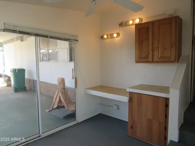 a view of room with furniture and windows