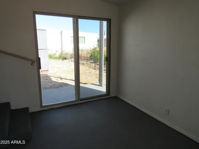 a view of a room that has a window in it