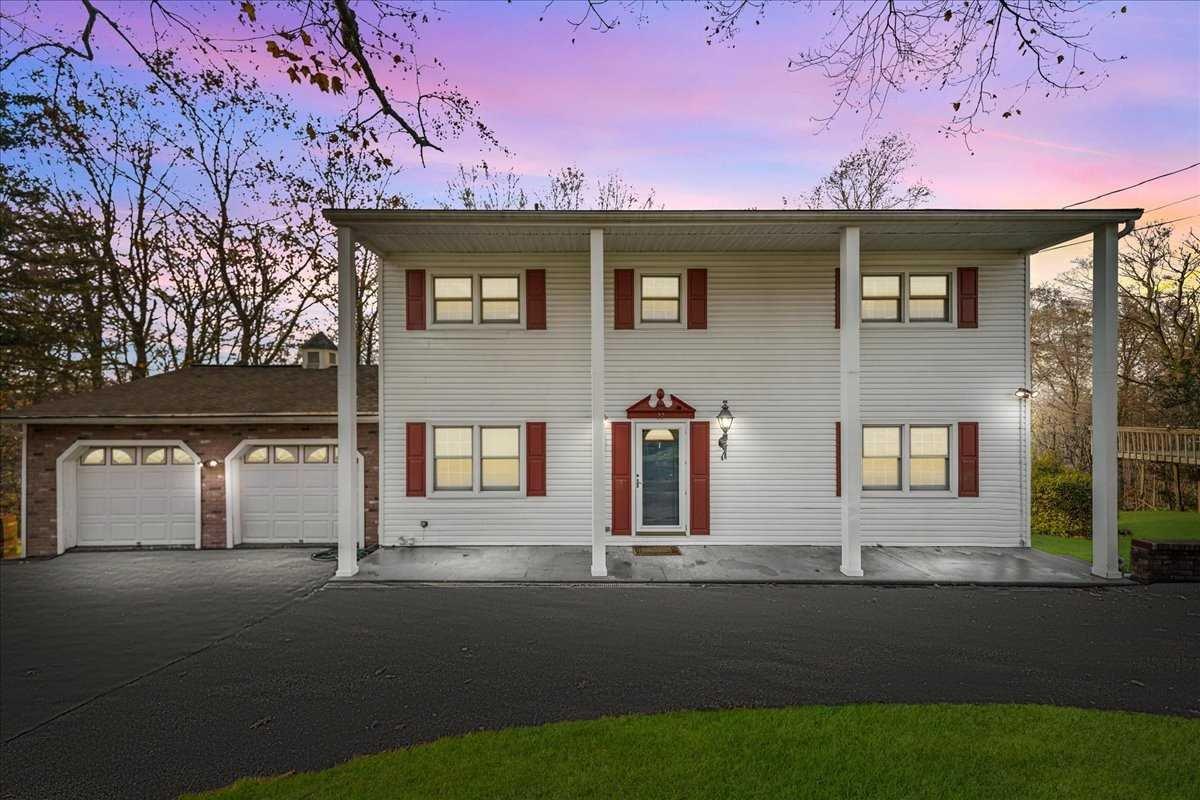 22 Laura Road Monroe, NY 10950 - Photo 1 of 1 a front view of a house with yard