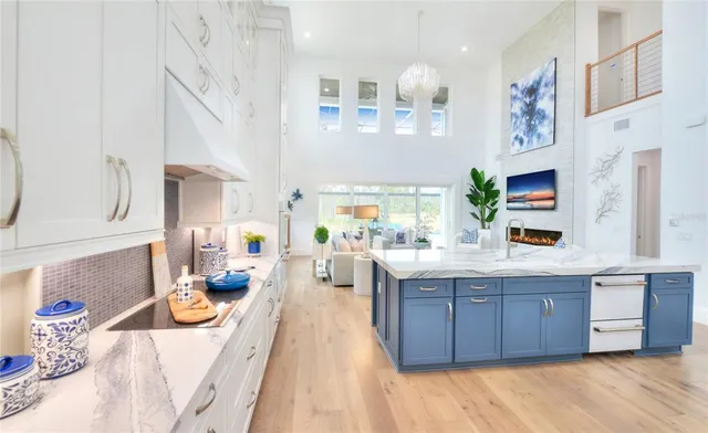 a living room with furniture fireplace and a flat screen tv