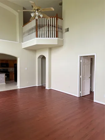 a view of an entryway door with a staircase