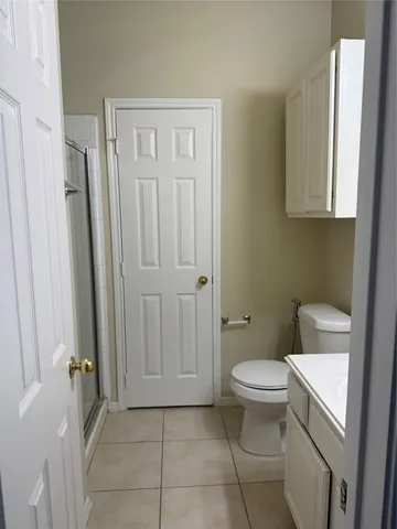 a bathroom with a toilet and a sink