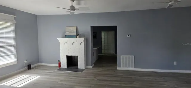 a view of a livingroom with a fireplace