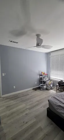 a utility room with sink dryer and washer