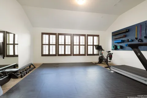 a room with furniture and a wooden floor