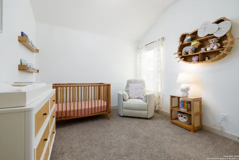 a view of livingroom with furniture and a window