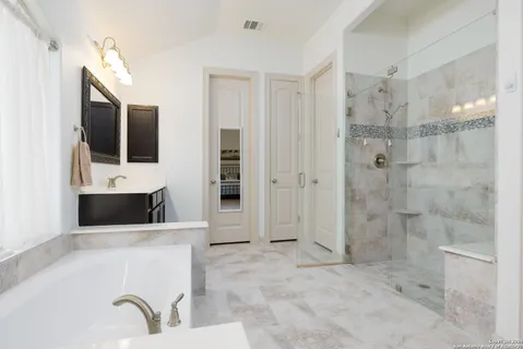 a living room with a couch and a flat screen tv