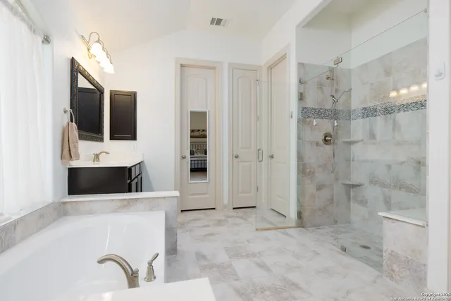 a living room with a couch and a flat screen tv