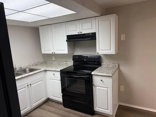 a bathroom with a shower and a mirror