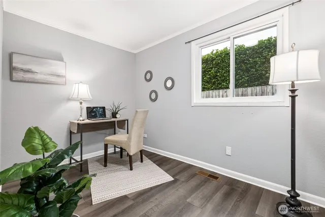 a view of storage and utility room with washer and dryer