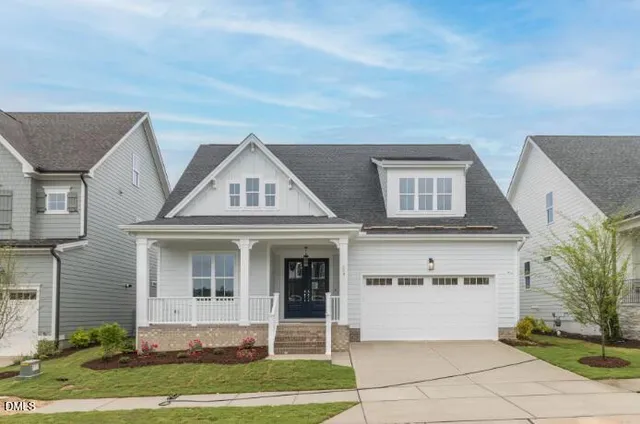 an empty room with windows and cabinet