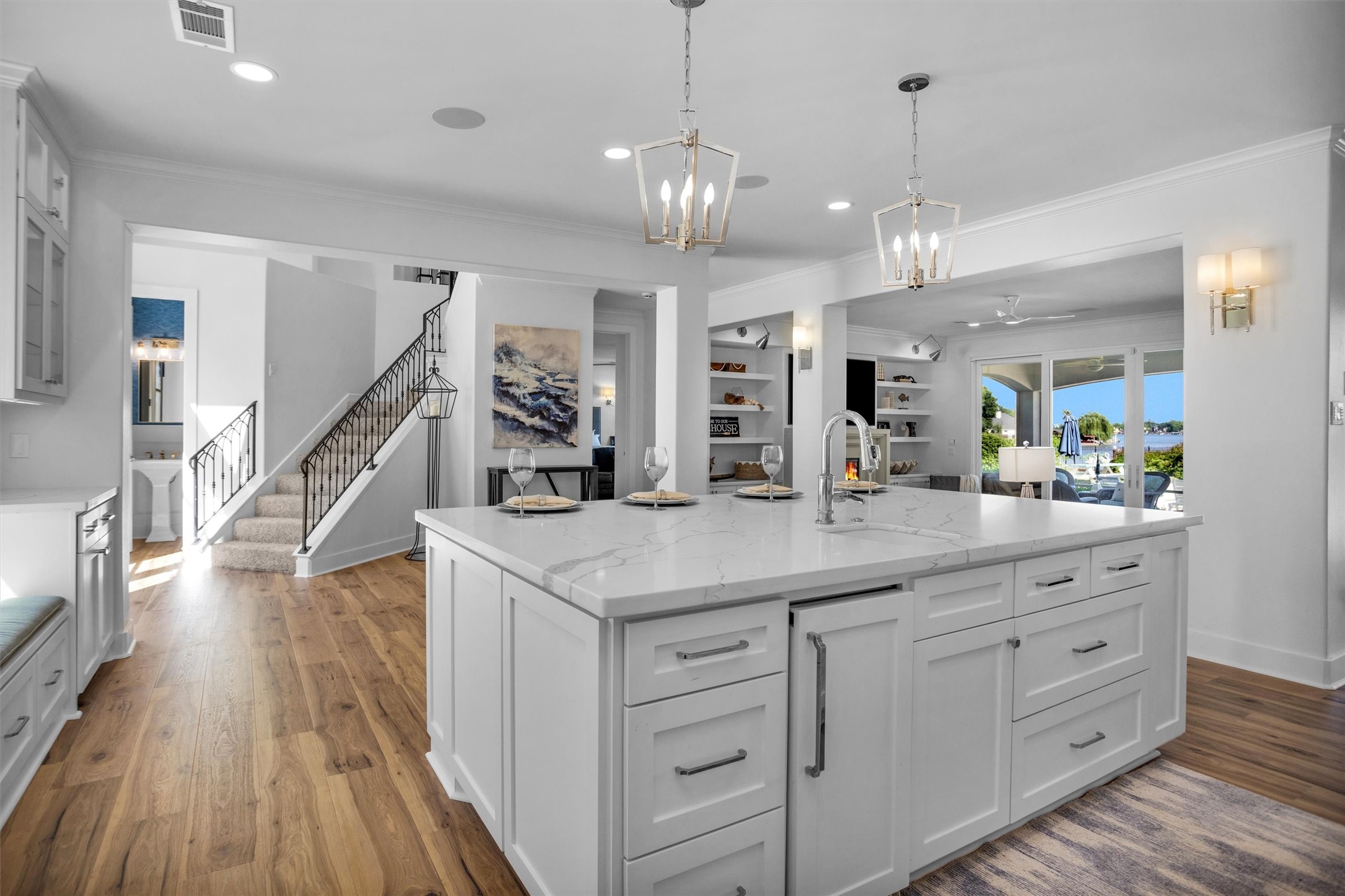 16059 Walden Road Conroe, TX 77356 - Photo 16 of 50 a kitchen with center island wooden floor appliances and a counter top space