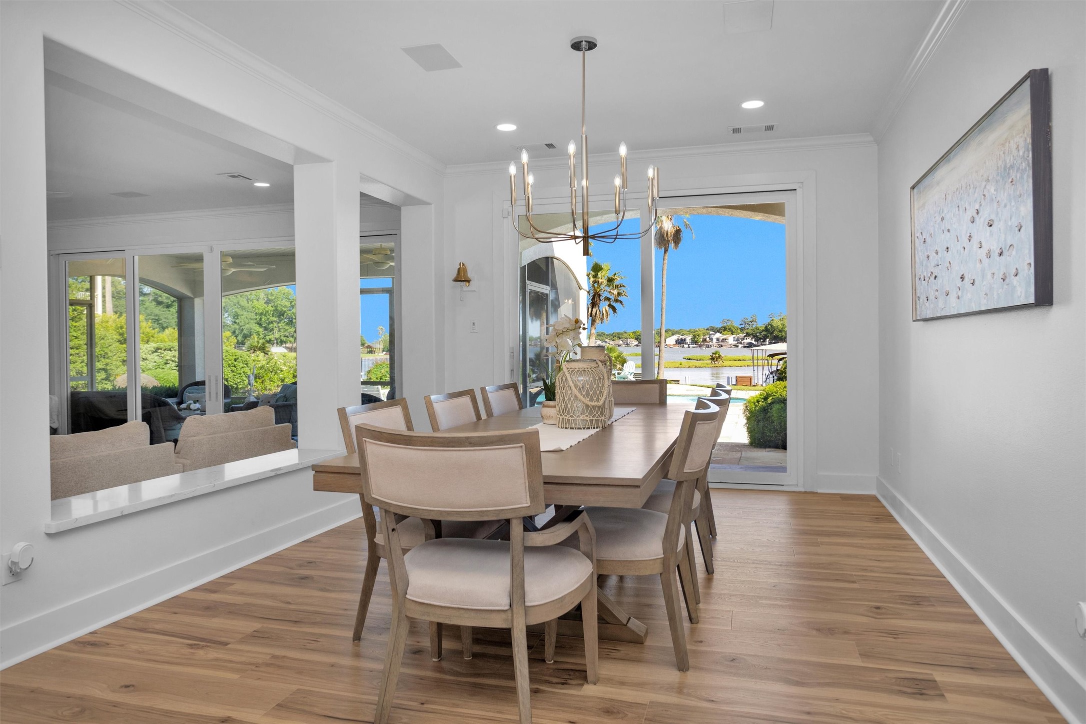 16059 Walden Road Conroe, TX 77356 - Photo 17 of 50 a view of a dining room with furniture and wooden floor