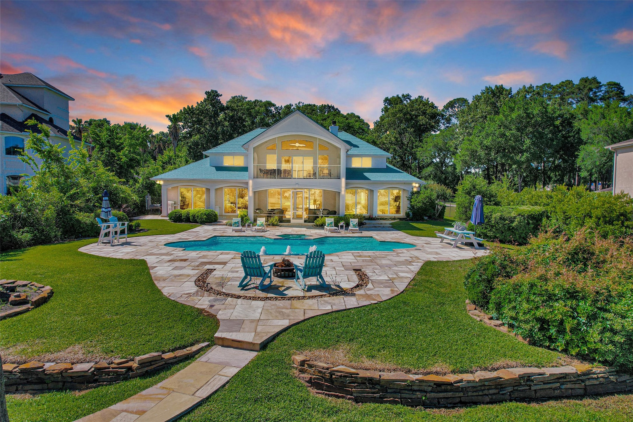 16059 Walden Road Conroe, TX 77356 - Photo 2 of 50 a front view of a house with a yard