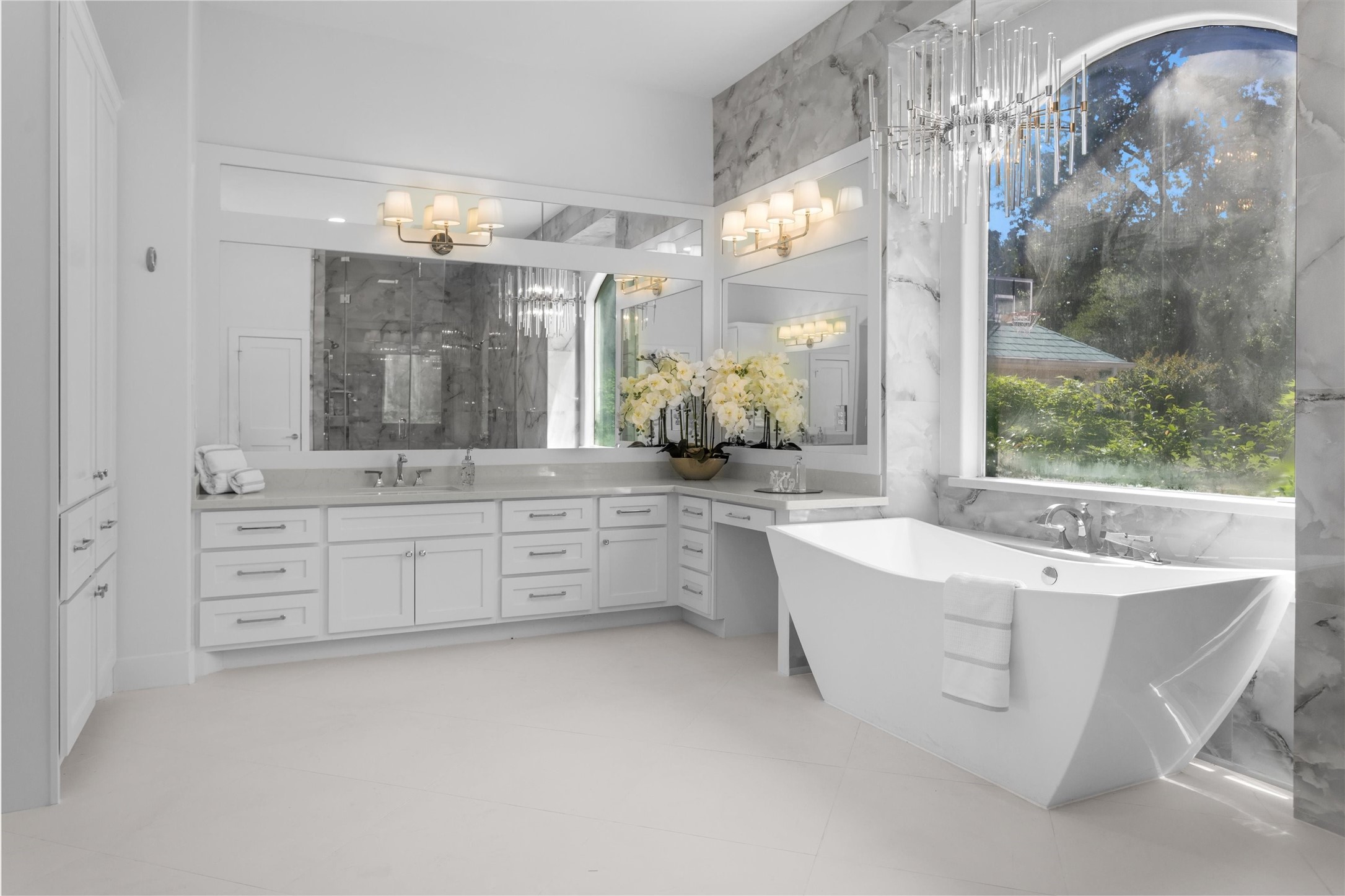 16059 Walden Road Conroe, TX 77356 - Photo 24 of 50 a bathroom with a double vanity sink mirror and bathtub