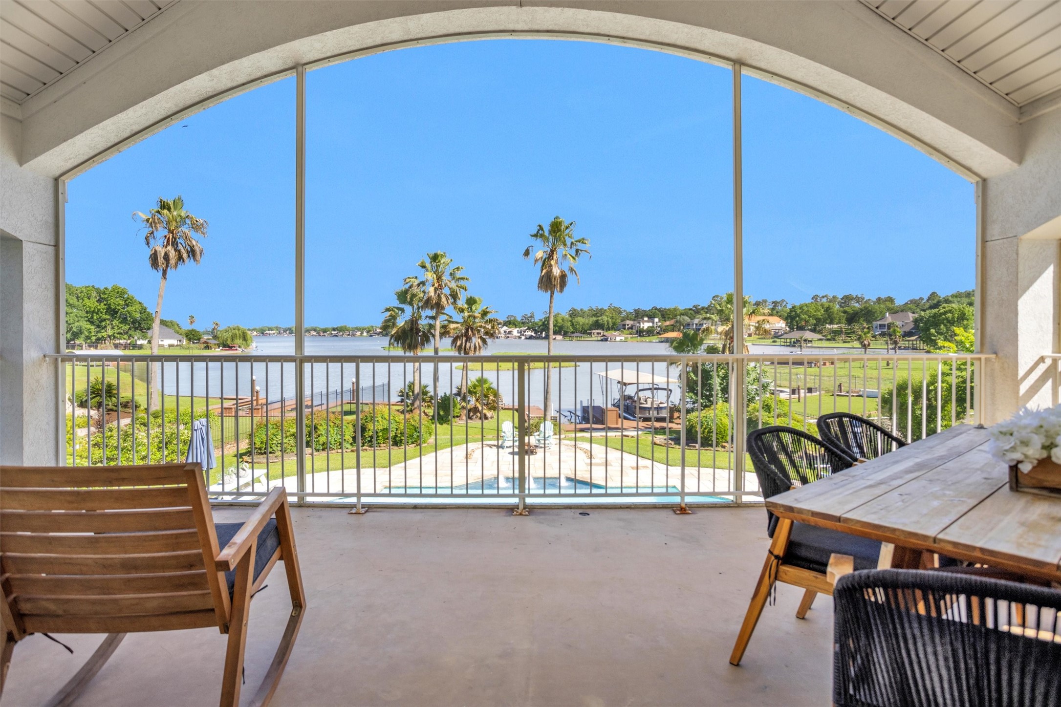 16059 Walden Road Conroe, TX 77356 - Photo 32 of 50 a view of balcony with furniture and outdoor view