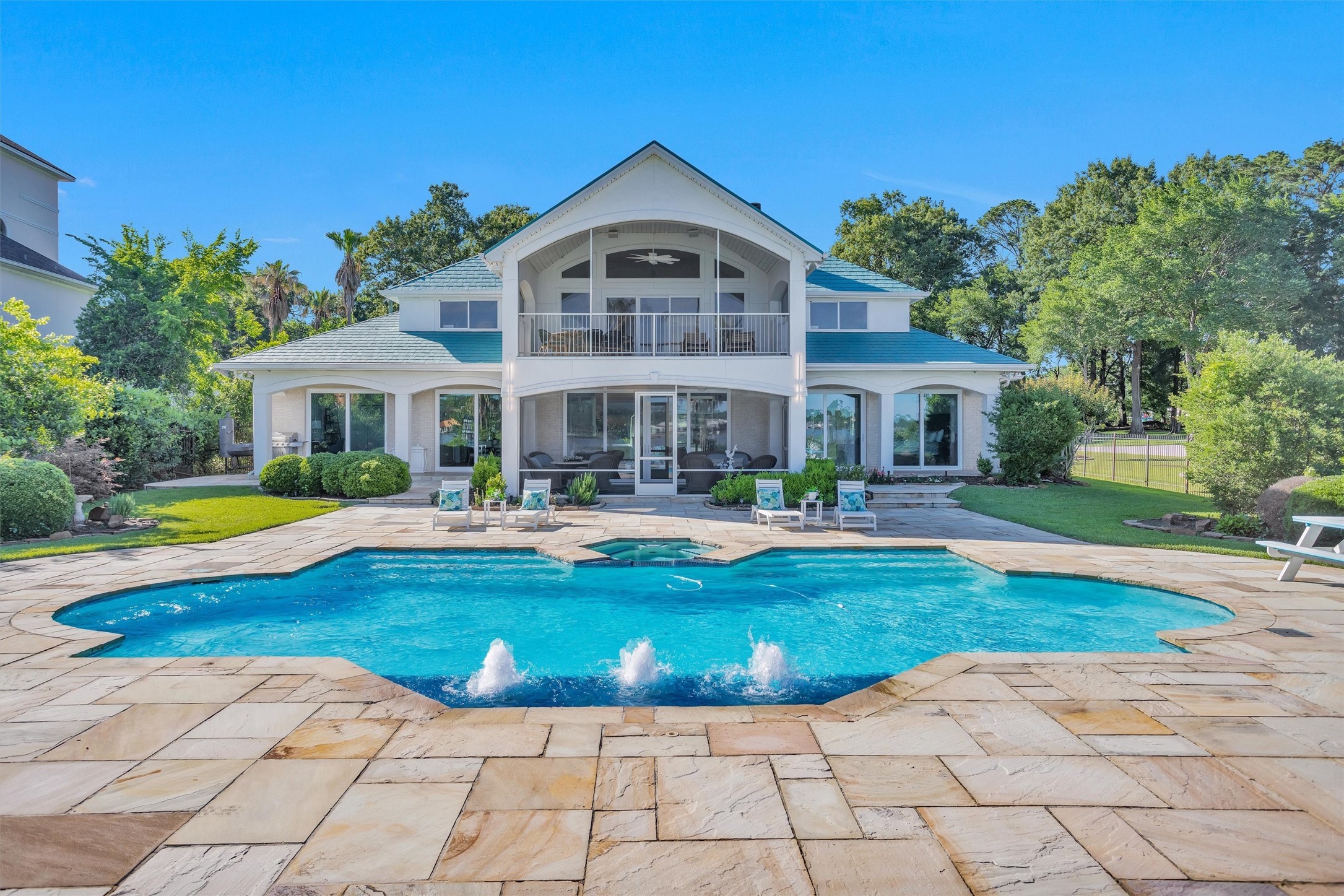 16059 Walden Road Conroe, TX 77356 - Photo 40 of 50 a view of a house with swimming pool