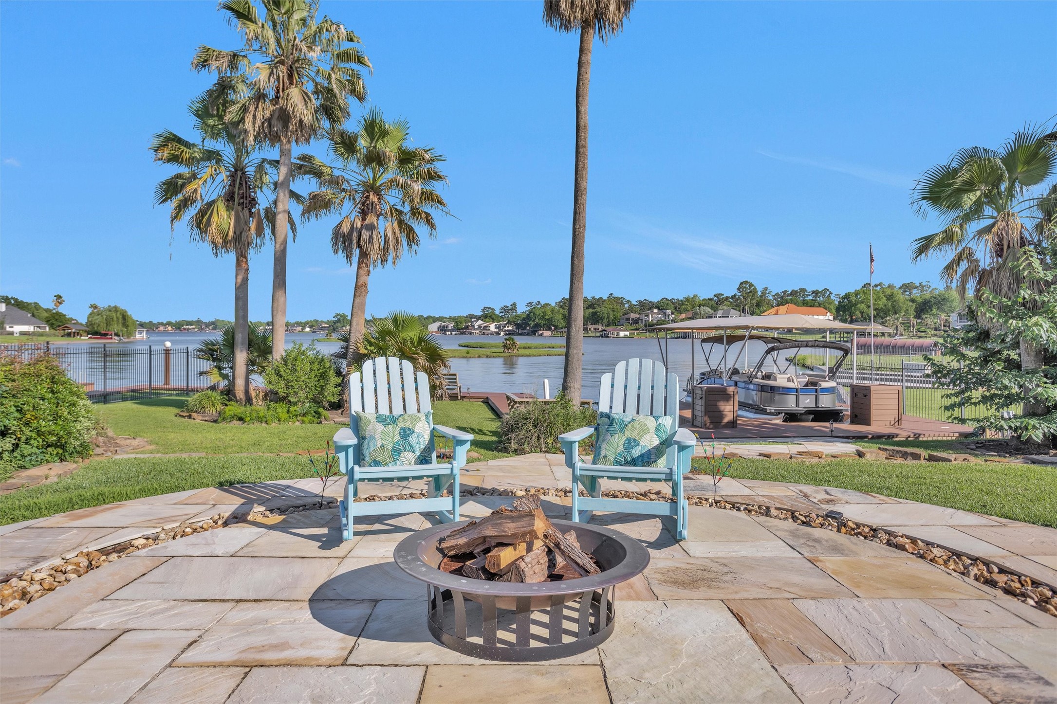16059 Walden Road Conroe, TX 77356 - Photo 41 of 50 a building view with a garden space and outdoor space