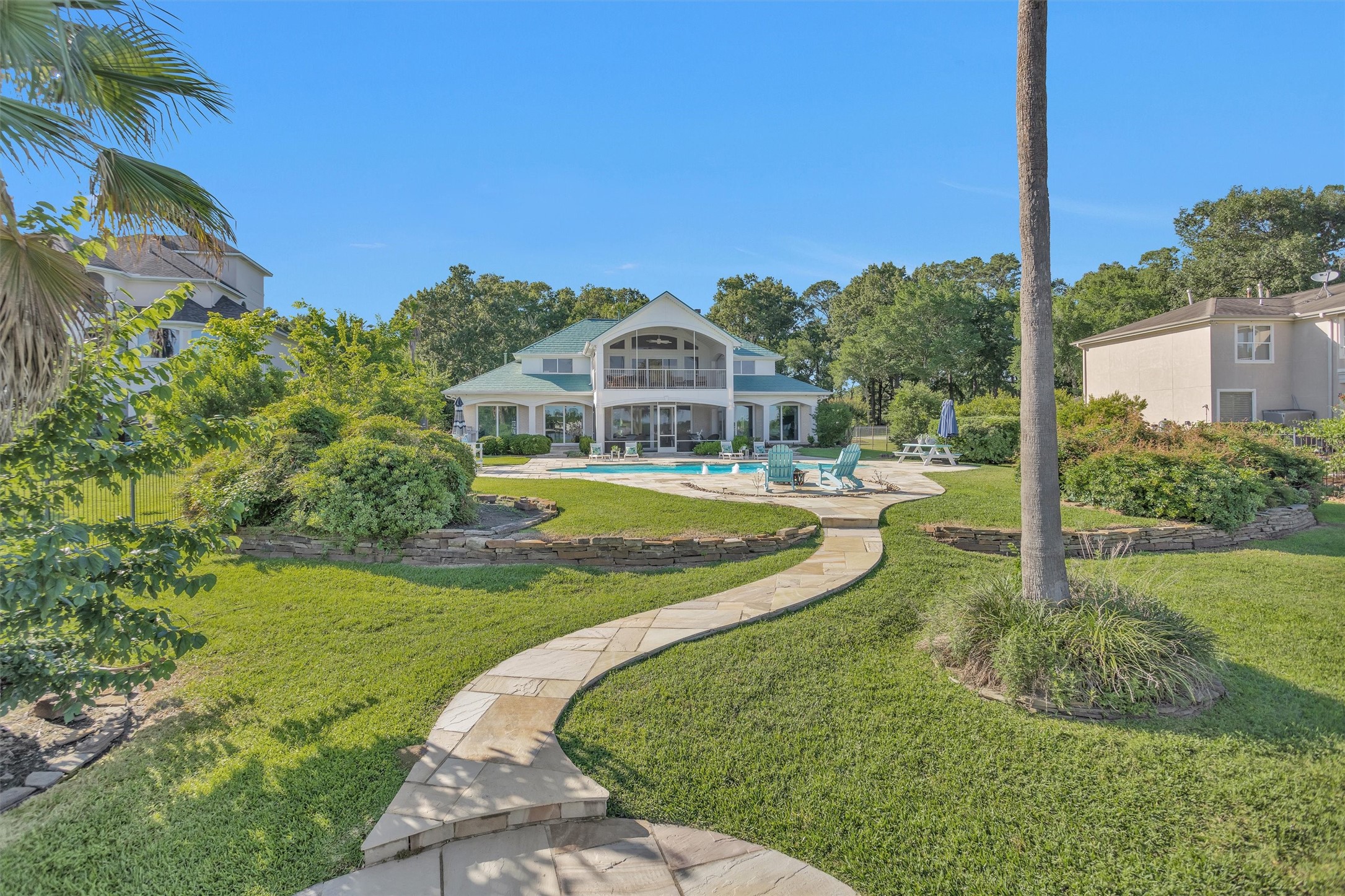 16059 Walden Road Conroe, TX 77356 - Photo 43 of 50 a view of a house with a big yard