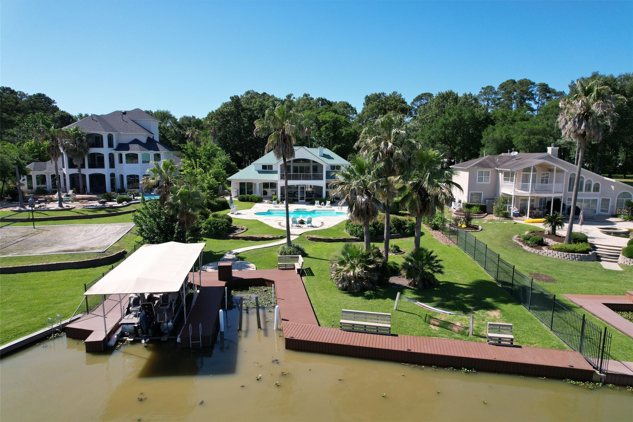 16059 Walden Road Conroe, TX 77356 - Photo 49 of 50 an aerial view of a house with swimming pool patio and outdoor seating