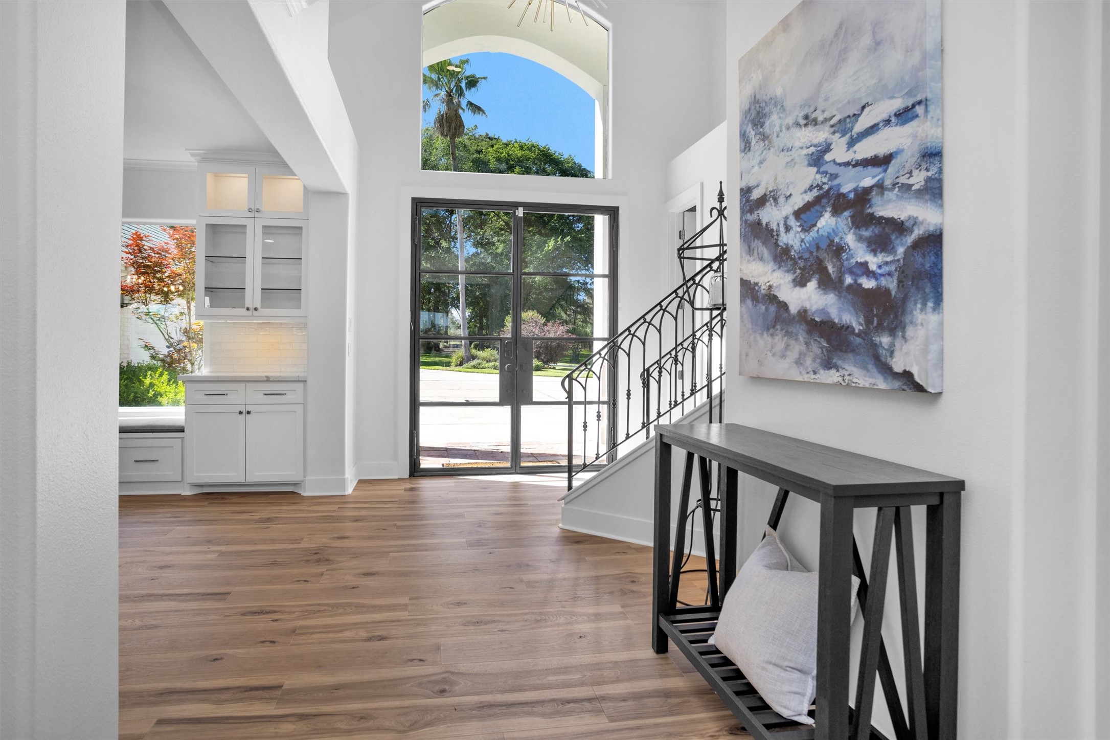 16059 Walden Road Conroe, TX 77356 - Photo 9 of 50 a view of entryway with stairs and wooden floor