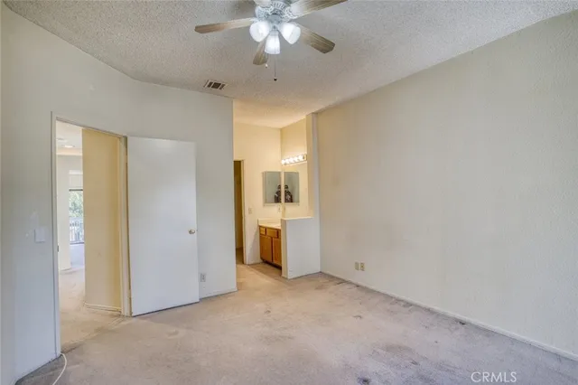 a bathroom with a toilet and a bathtub