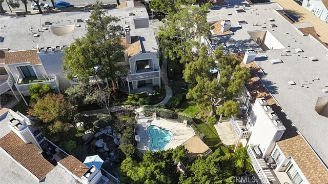 a view of a tree with a yard