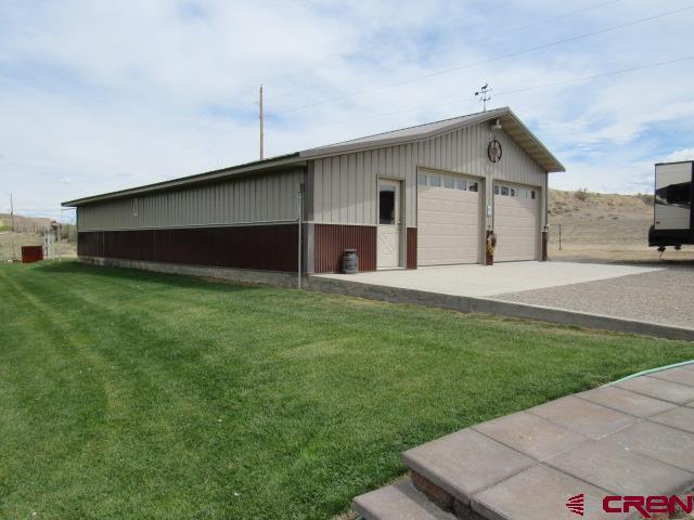 6184 1900th Road Delta, CO 81416 - Photo 3 of 28 a house view with a outdoor space