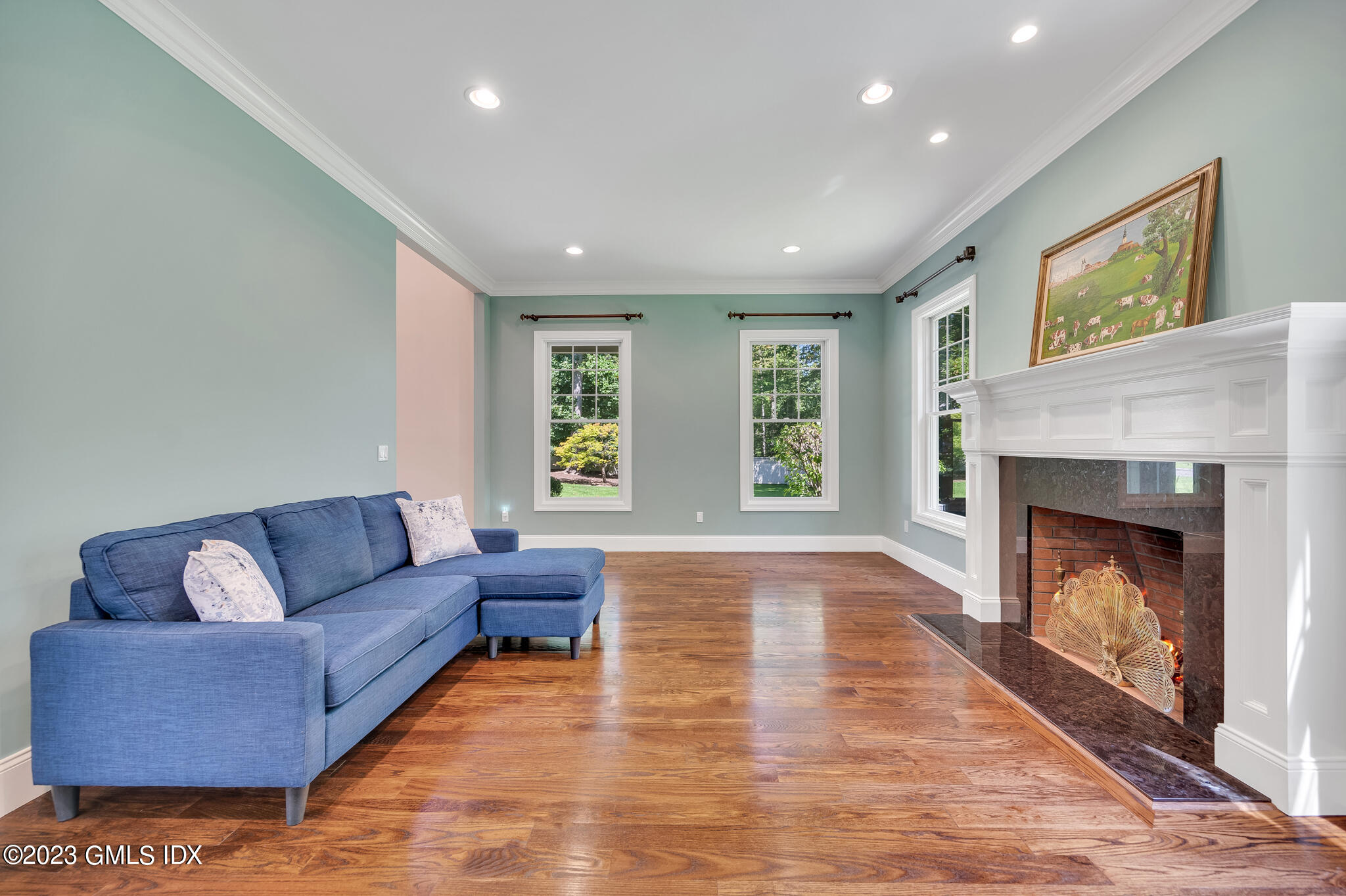 58 Perkins Road Greenwich, CT 06830 - Photo 11 of 30 a living room with furniture and a fireplace