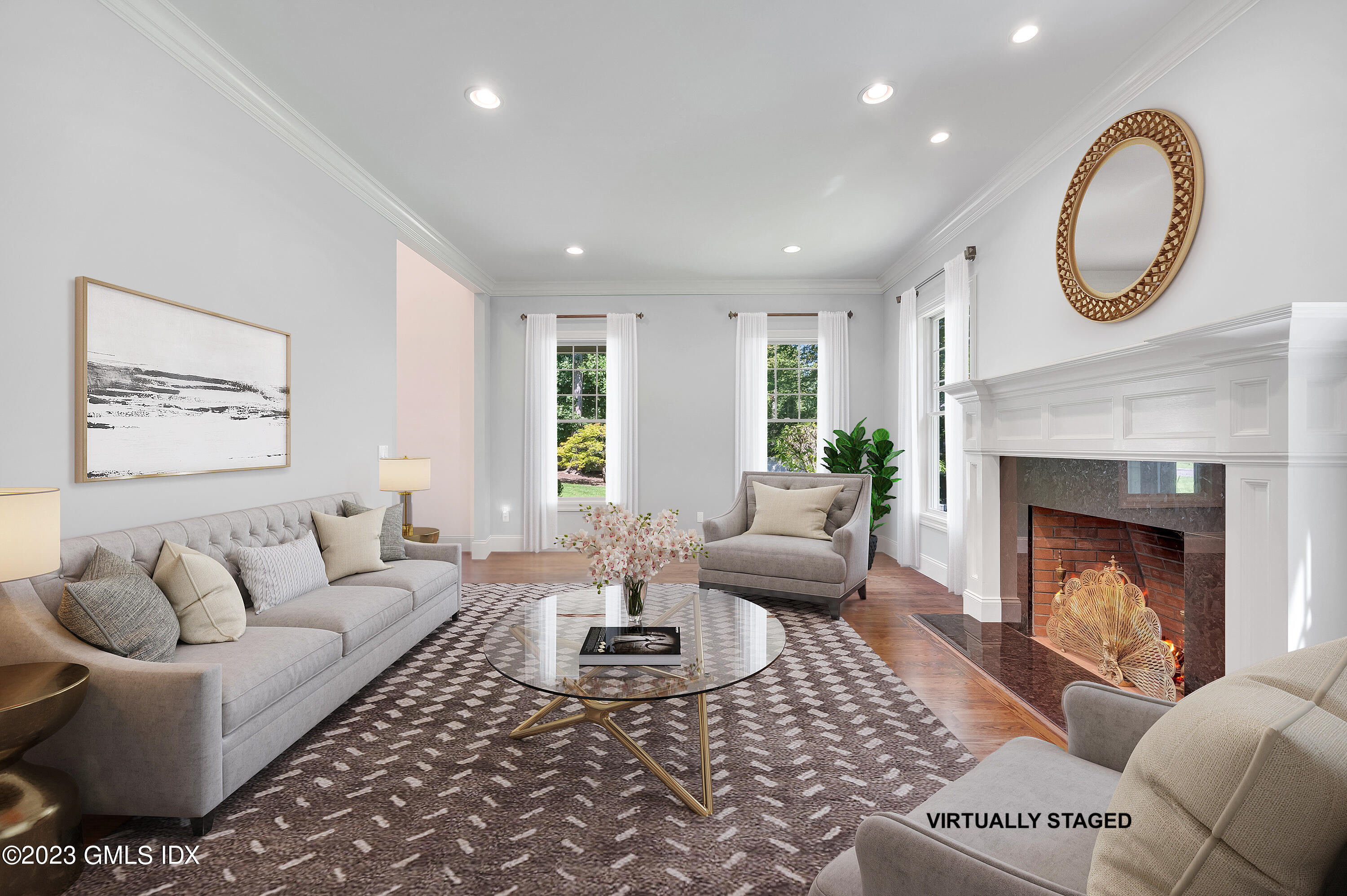 58 Perkins Road Greenwich, CT 06830 - Photo 12 of 30 a living room with furniture and a fireplace