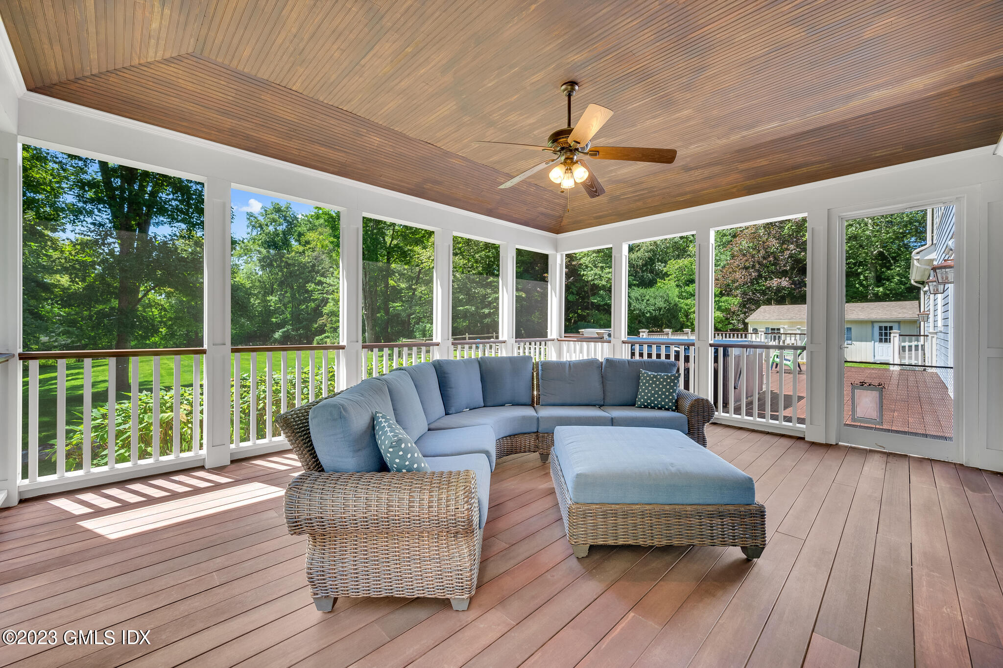 58 Perkins Road Greenwich, CT 06830 - Photo 17 of 30 a living room with furniture and a large window