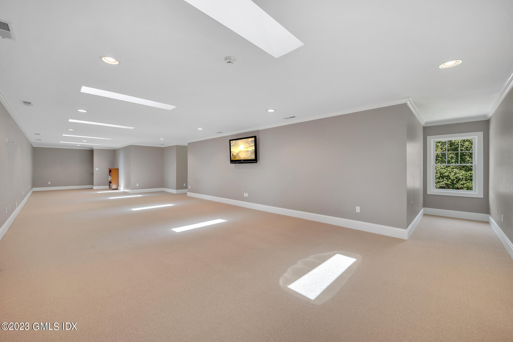 58 Perkins Road Greenwich, CT 06830 - Photo 24 of 30 an empty room with windows