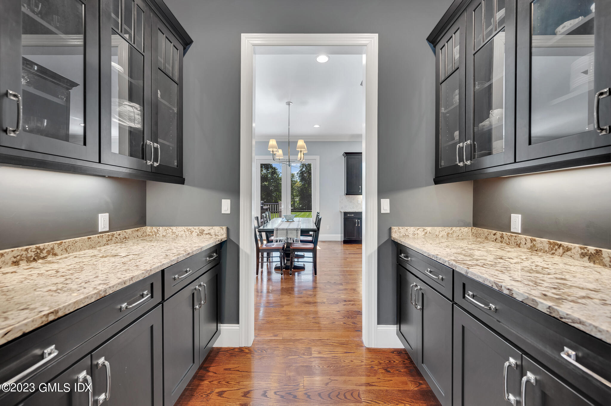 58 Perkins Road Greenwich, CT 06830 - Photo 6 of 30 a kitchen with granite countertop counter top space a sink appliances and cabinets