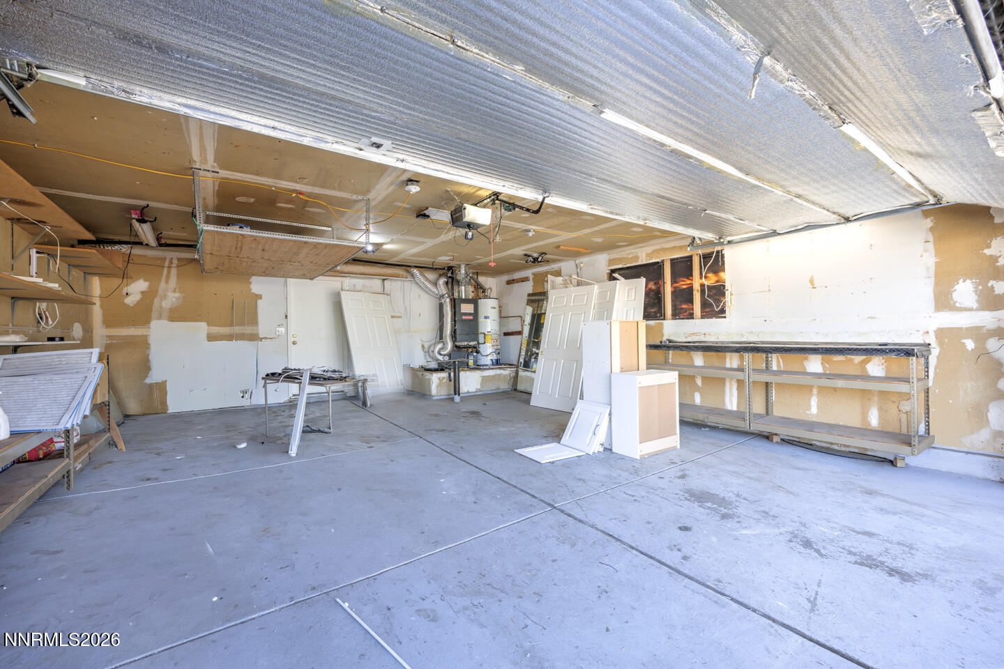 590 Fargo Way Fernley, NV 89408 - Photo 18 of 25 a view of a empty room with wooden floor