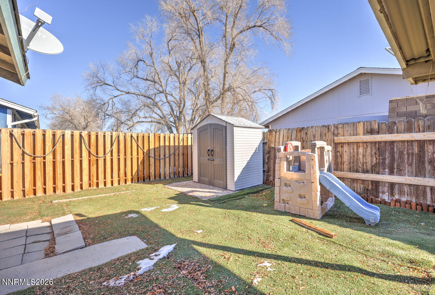 590 Fargo Way Fernley, NV 89408 - Photo 20 of 25 a view of a house with wooden floor and roof deck