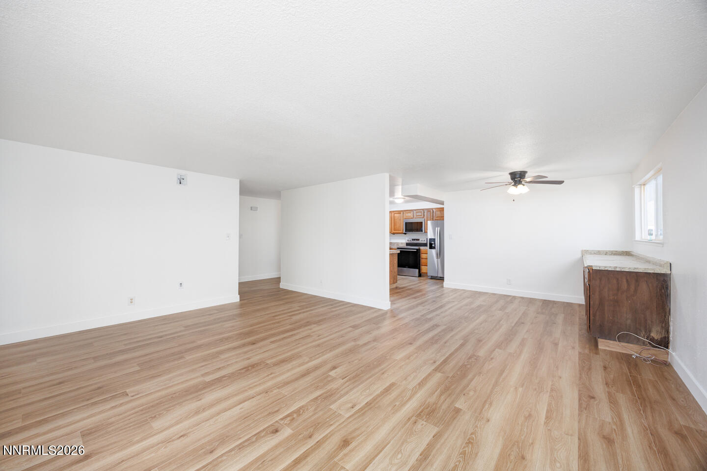 590 Fargo Way Fernley, NV 89408 - Photo 4 of 25 wooden floor in an empty room
