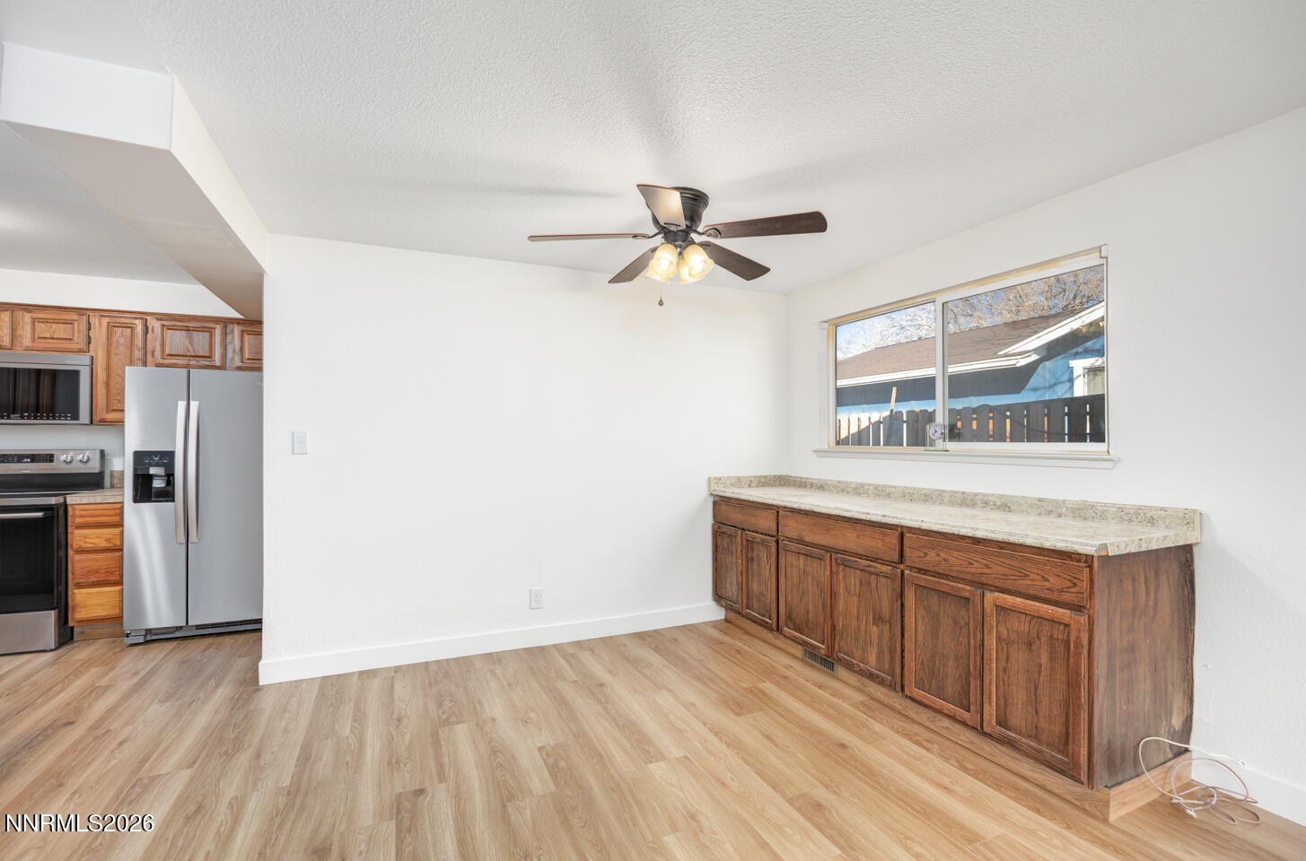 590 Fargo Way Fernley, NV 89408 - Photo 7 of 25 a view of a kitchen with a sink and a window