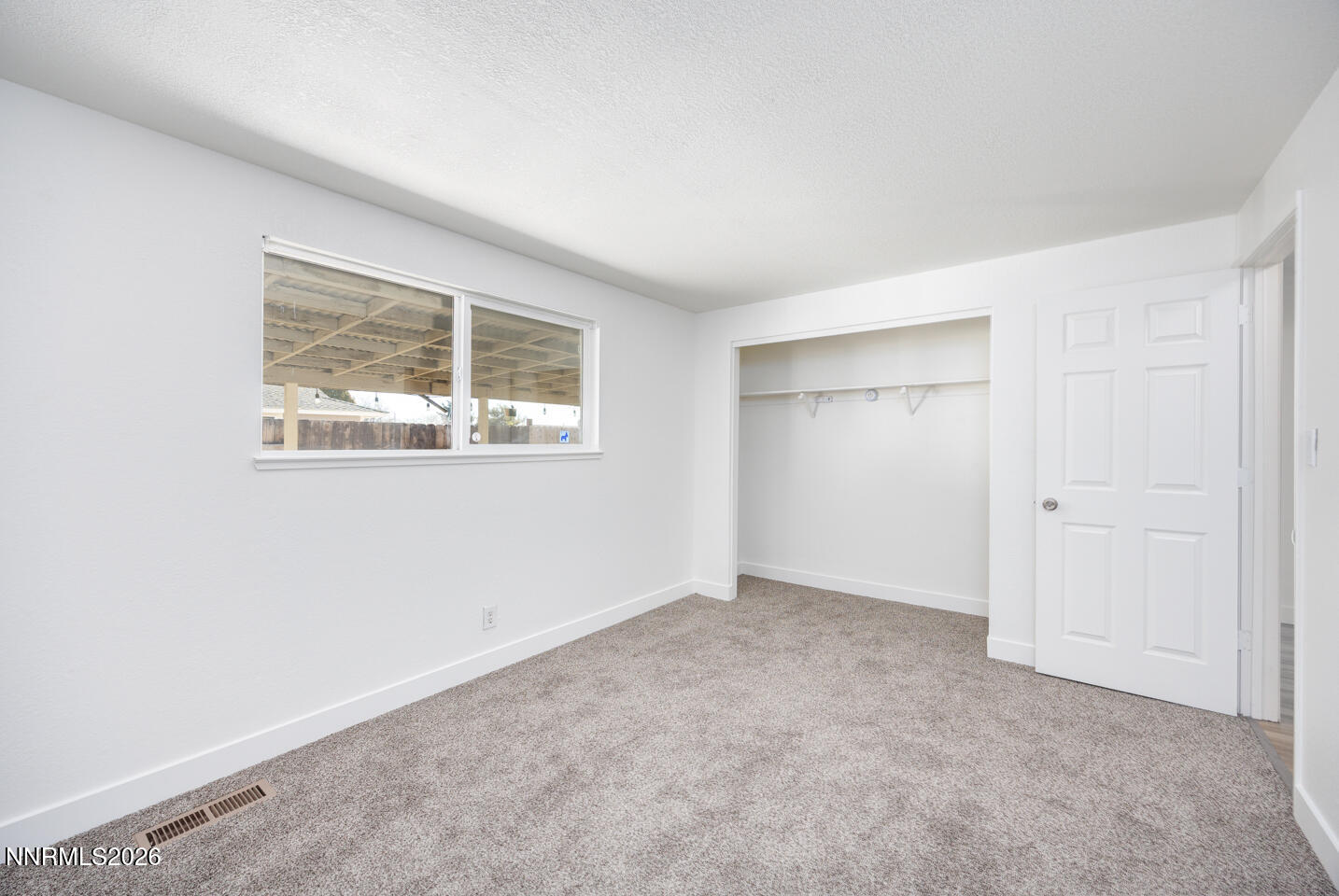 590 Fargo Way Fernley, NV 89408 - Photo 10 of 25 an empty room with a window