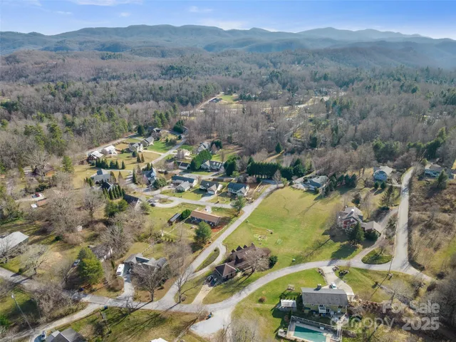 an aerial view of residential house with outdoor space